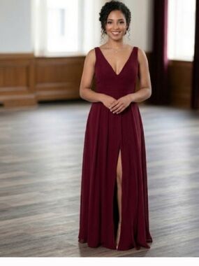 Adelyn Rae Burgundy Sleeveless V-Neck Maxi Dress with an opening between the leg